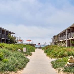 Marram Montauk resort exterior with dune pathway and ocean views
