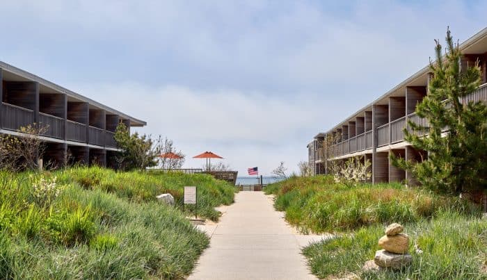 Marram Montauk resort exterior with dune pathway and ocean views