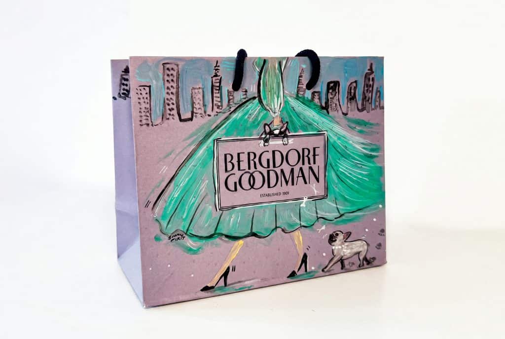 Illustrated Bergdorf Goodman shopping bag featuring a fashion sketch
