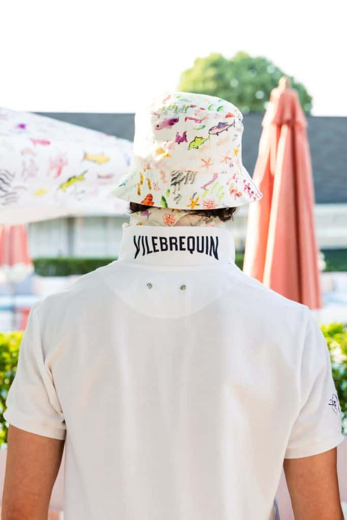 Back of the Maison Close x Vilebrequin uniform with Vilebrequin branding and a Pescador neckerchief