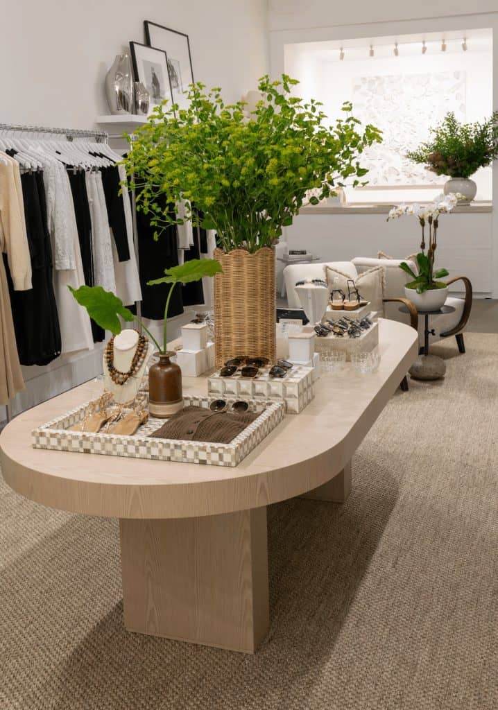 TOCCIN Southampton interior with a curated display of accessories and a clothing rack, designed to feel like a living room.