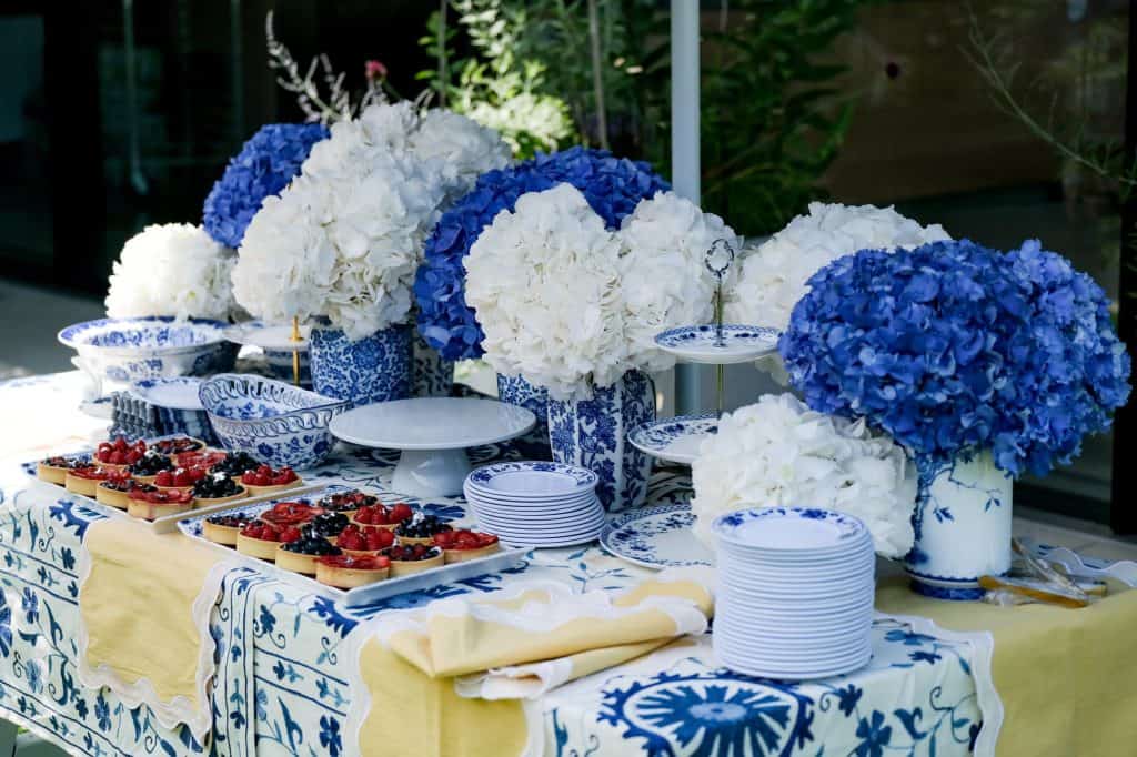 Blue and white floral tablescape at the summer celebration