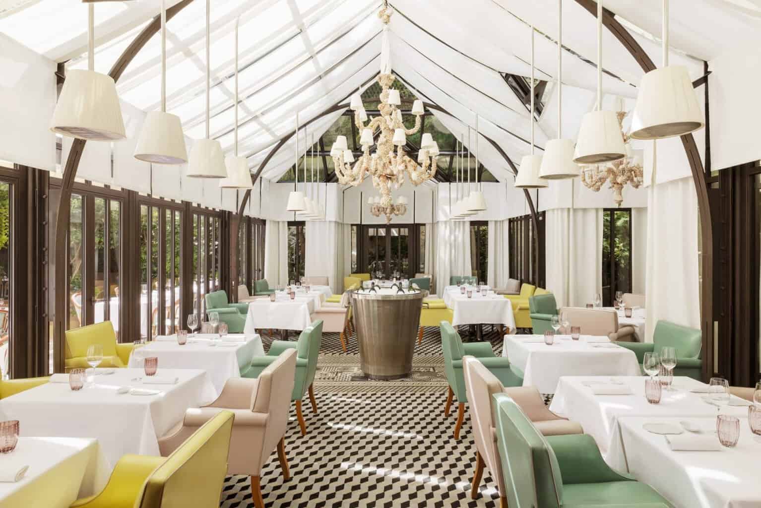 The glass-roofed dining room at Il Carpaccio, Le Royal Monceau