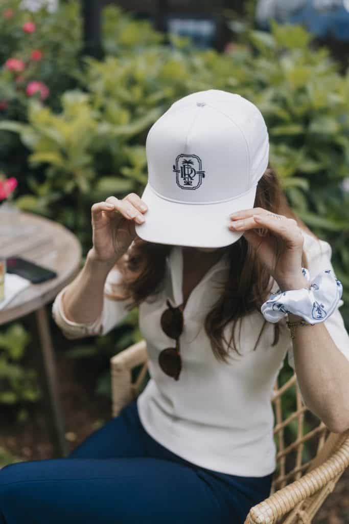 Rexford Drive golf caps at the launch