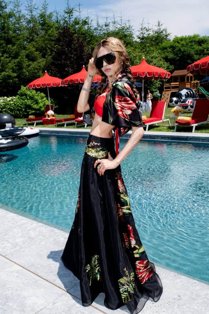 Stacey Bendet hosting her poolside summer celebration in Water Mill