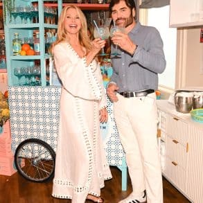 Christie Brinkley raising a Malfy Gin spritz at the Project Zero cocktail cart