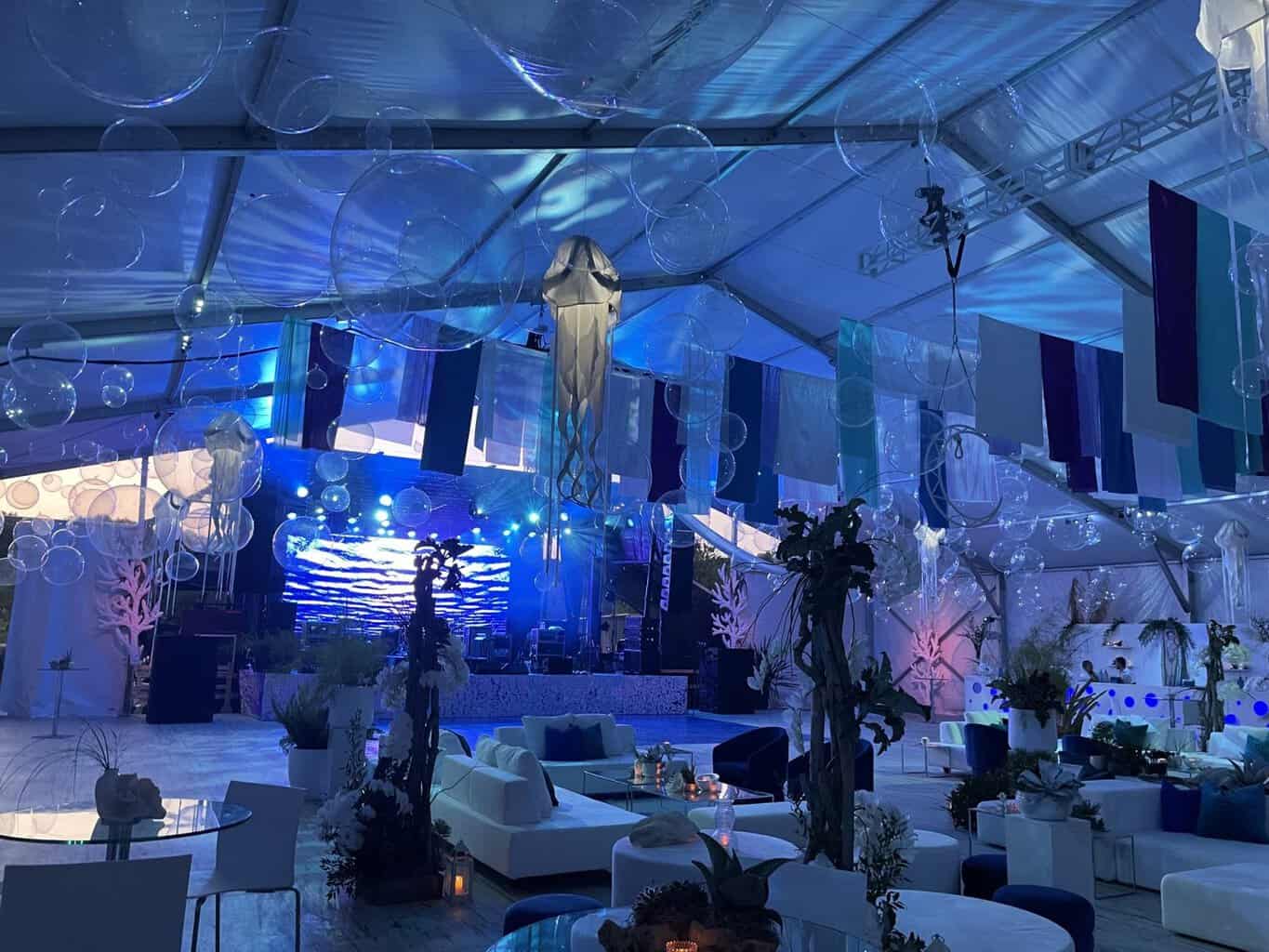 Lighting design by Decco inside an event tent