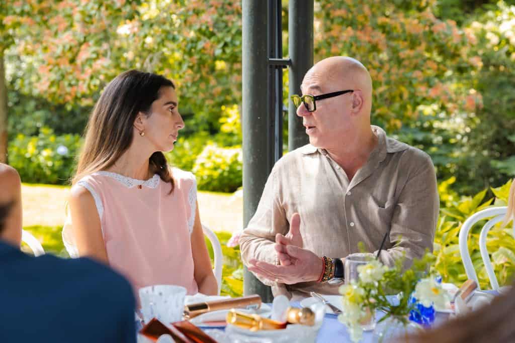 Guests at the Hampton Sun luncheon in the gardens of The Hedges Inn