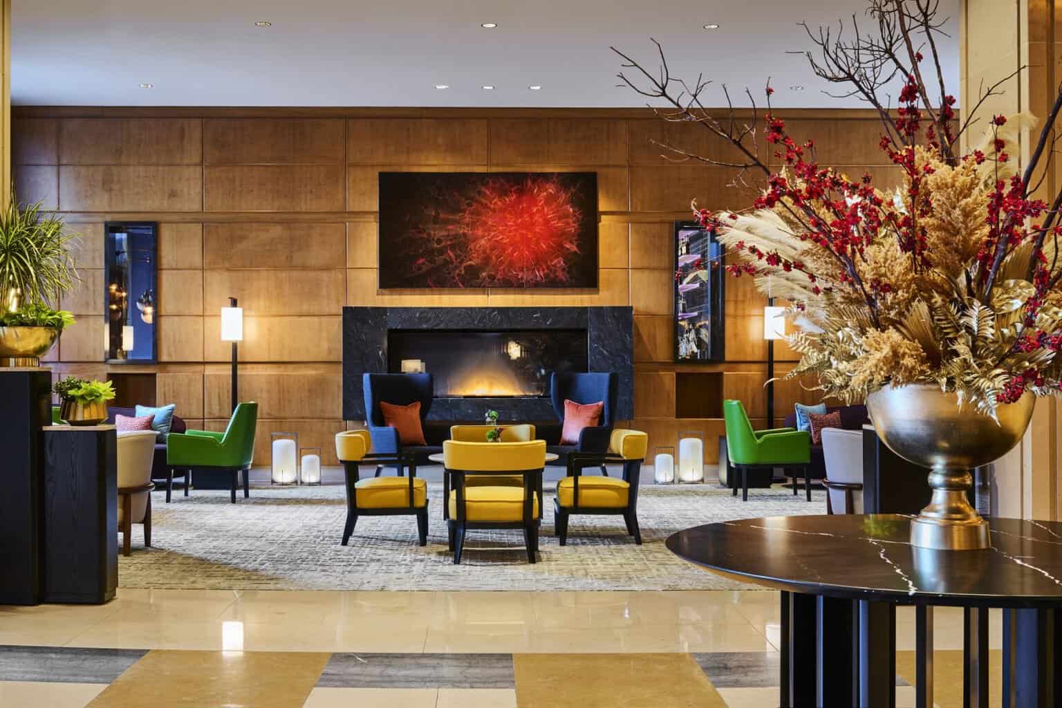 Lobby seating area with fireplace and contemporary art at Mandarin Oriental, Boston