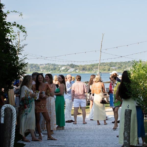 Guests gather at sunset for the Surfrider Foundation One Ocean Gala at The Crow’s Nest in Montauk