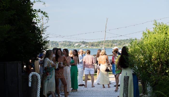 Guests gather at sunset for the Surfrider Foundation One Ocean Gala at The Crow’s Nest in Montauk