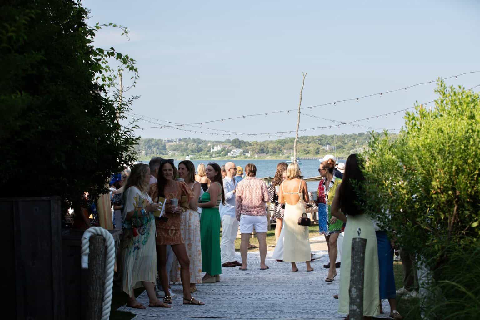 Guests gather at sunset for the Surfrider Foundation One Ocean Gala at The Crow’s Nest in Montauk